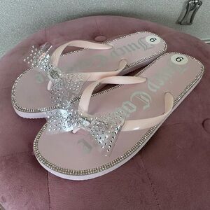 Juicy Couture rhinestone bow flip flops size 9
Never worn
